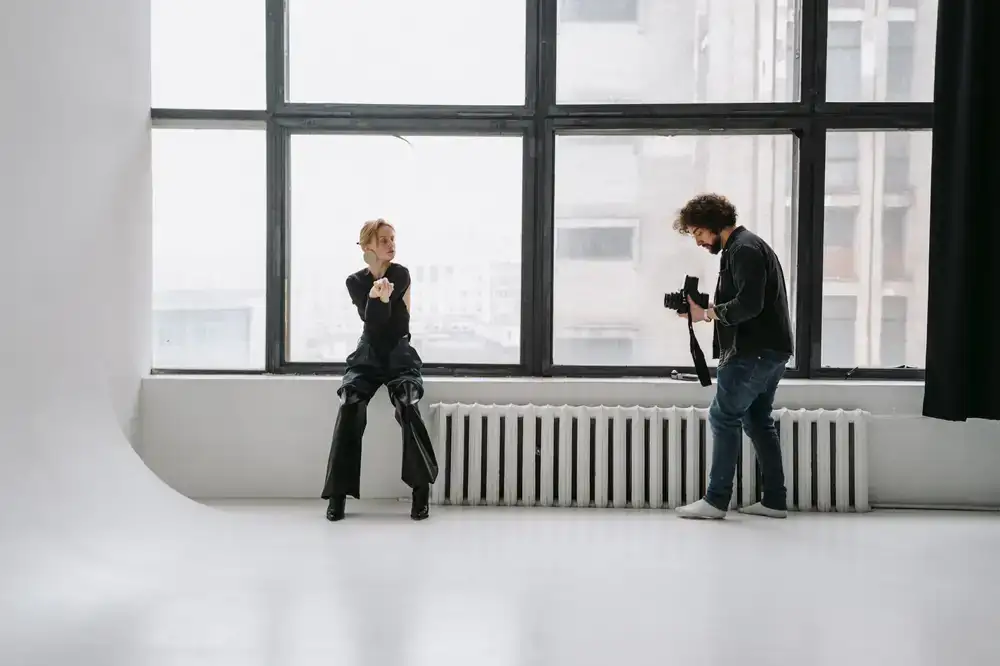 Behind the scenes shot of a fashion editorial setup in the studio