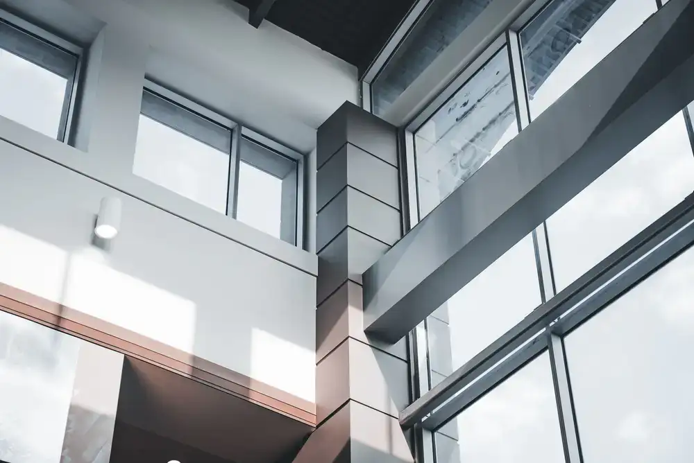 Documentary shot of the bright corner cyclorama space with natural light pouring in